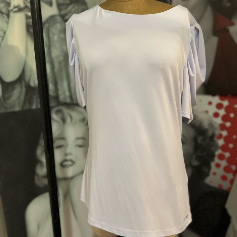Calving Klein blouse perfect for work or fresh going out blouse